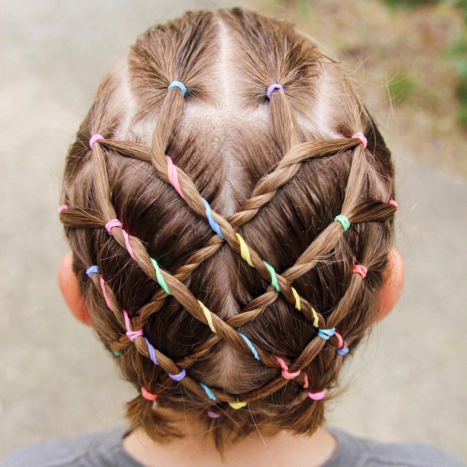 Back view of Criss-Cross Rubber Band Pattern hairstyle for boys